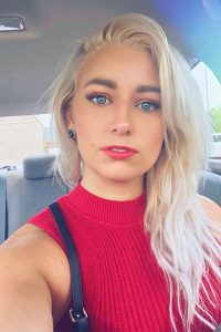 Alexandria Knight with blue eyes and red lips stick