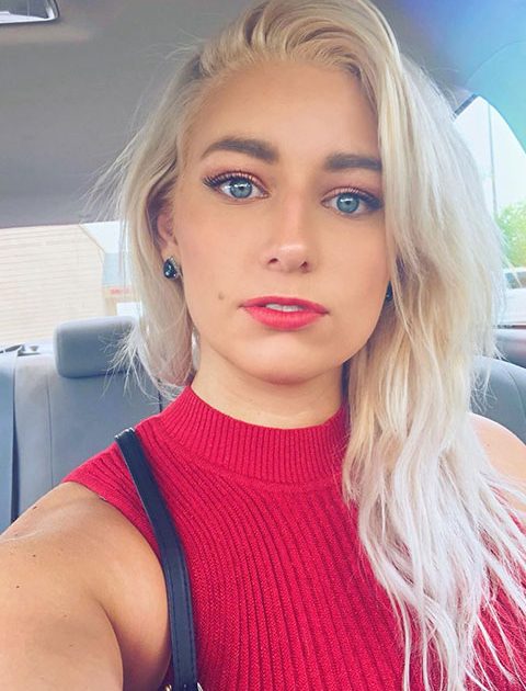 Alexandria Knight with blue eyes and red lips stick