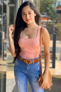 Jannat Zubair Rahmani wearing pink top complementing her stunning physique