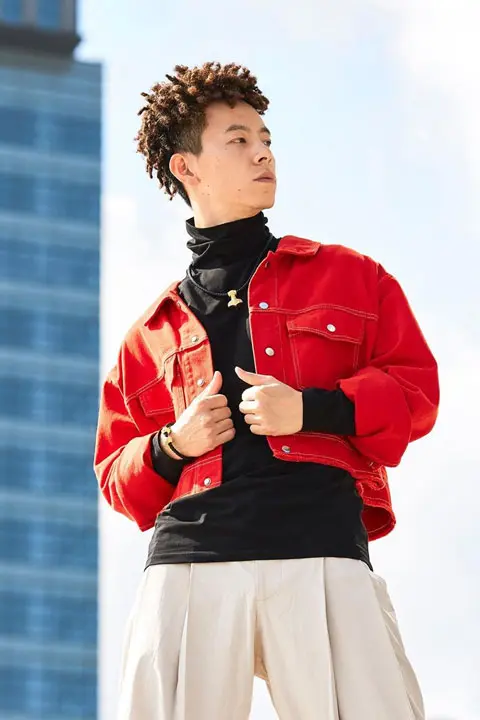 Jin Jun looking handsome in his red jacket, black shirt and white trousers.