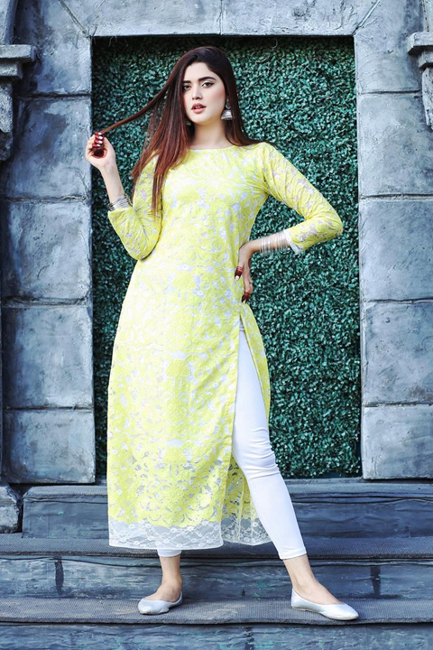 Kanwal Aftab wearing lemon dress and mehandi. Showing her beautiful feminine stature