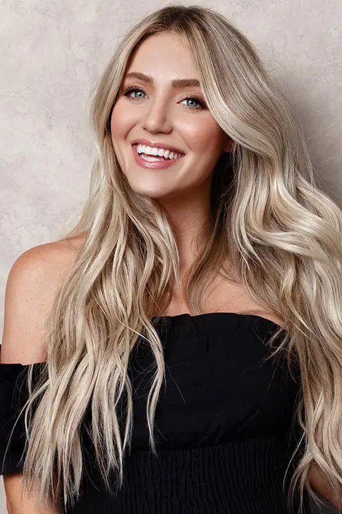 Savannah Soutas with a powerful smile and perfectly placed white hair colour