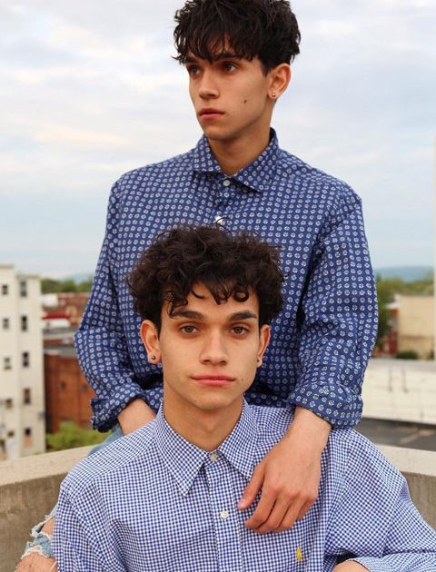 The Dobre Twins wearing check shirts and showing their cute and handsome smiles.