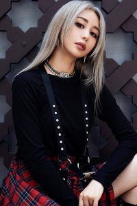 Wengie Jie looking stunning her goth with choker and black shirt and checked skirt.