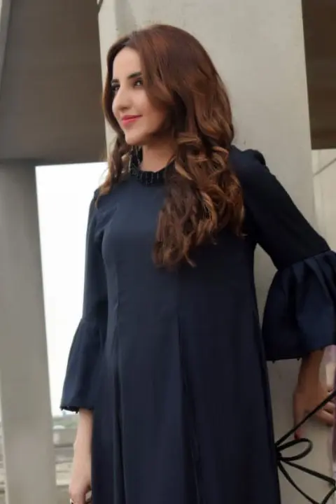 Hareem Shah showing excitement in her eyes while wearing blue dress