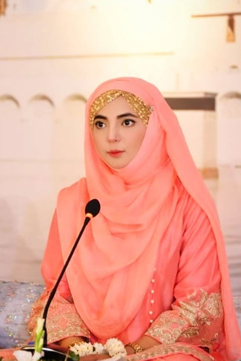 Zahra Haidery in pink dress and abbaya