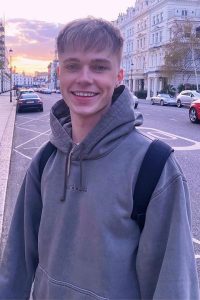 HRVY is giving smile and he is looking beautiful in grey upper.