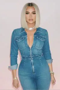 Khloe Kardashian is wearing demins style suite