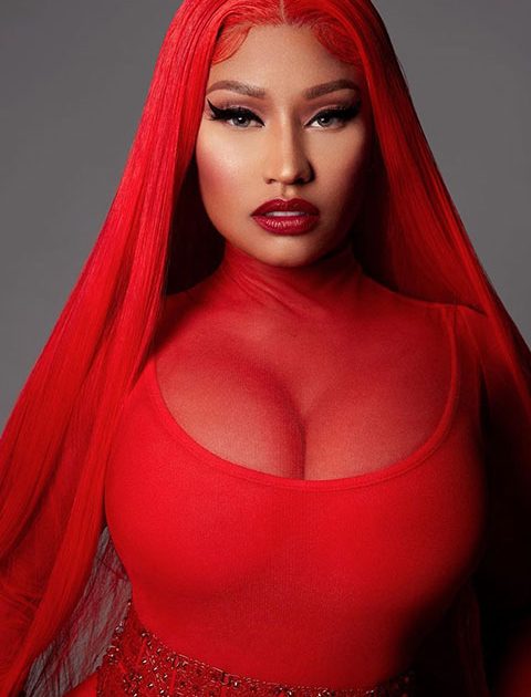 Nicki Minaj is looking hot in red dress and open hairs