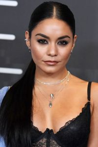 Vanessa Hudgens is looking beautiful in black dress and the silver chains in her neck are looking stunning.