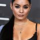 Vanessa Hudgens is looking beautiful in black dress and the silver chains in her neck are looking stunning.