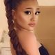 Paige Niemann Doppelganger of Ariana Grande in black dress and pony tail