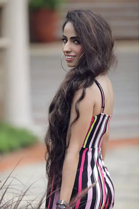 Simran Keyz posing in her lining dress
