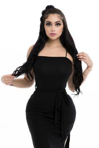 Jailyne Ojeda is looking gorgeous in full black dress and open hair.
