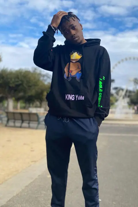 KING Yabba wearing his own merch brand clothes