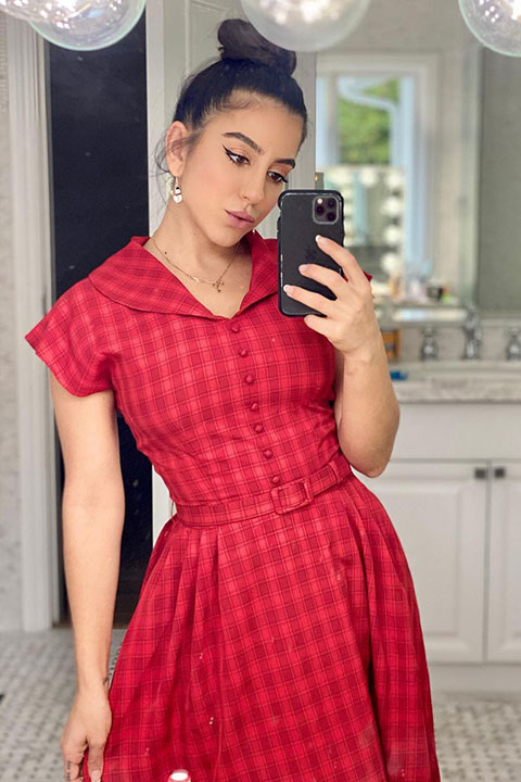 Lena The Plug is taking selfie in red frock and looking beautiful.
