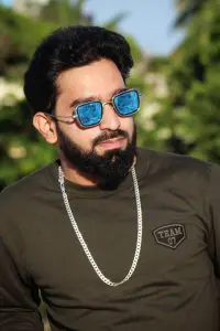 famous Indian Tiktok Star Saud Khan posing in brown tshirt