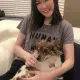 Rumay Wang (Hafu) cuddling her dog