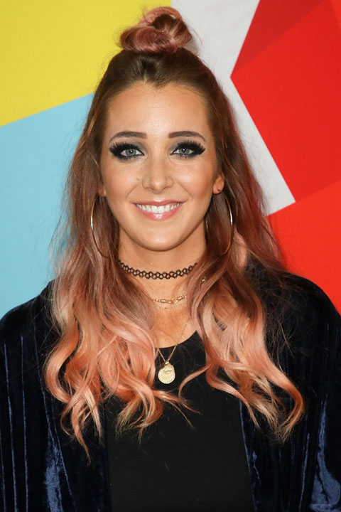 Jenna Marbles is giving smile and looking beautiful in open hair.