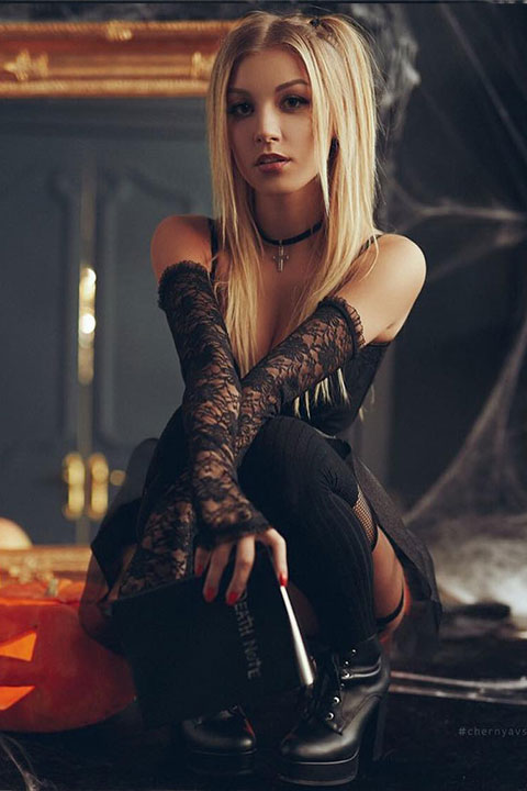 Ekaterina Novikova in laced black dress with blonde hairs