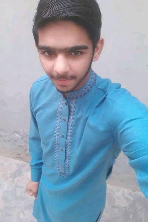 Muhammad Usman in light blue kameez shalwar